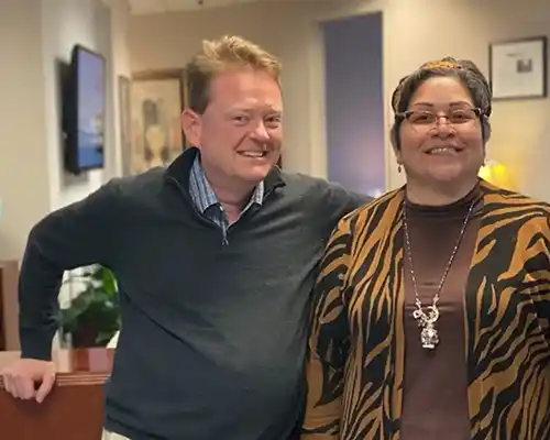 Chris Leitch and Lisa Mims standing in their Commonwealth Centre Office in Midlothian, VA