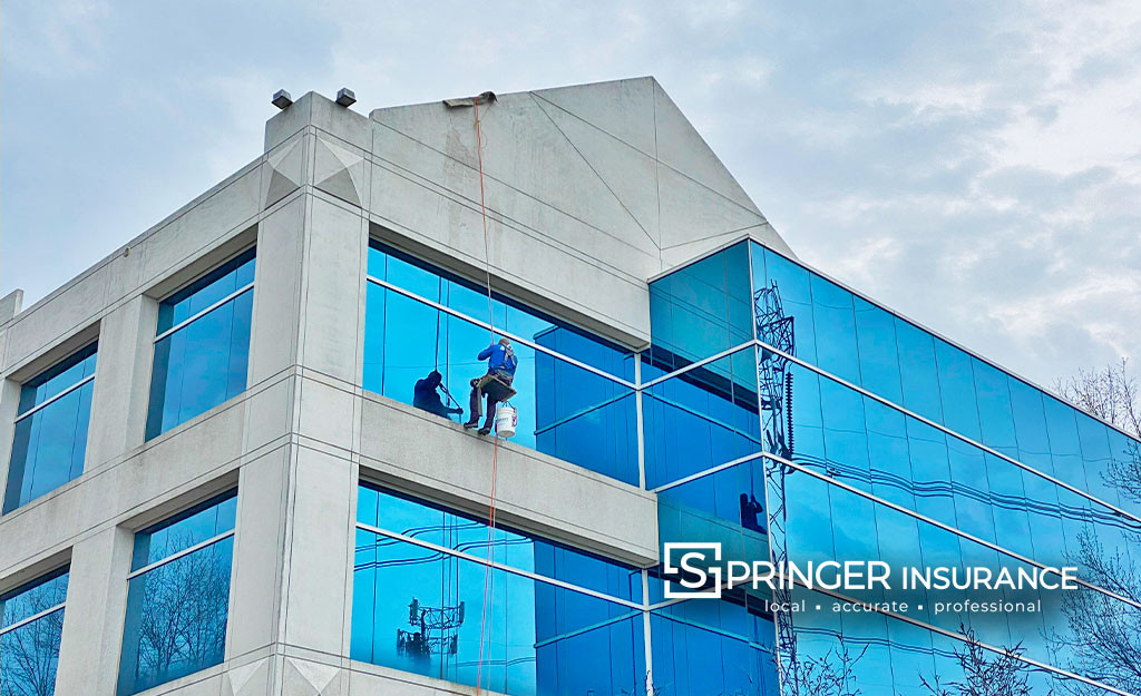 Window cleaner 4 stories up at our building - no way I would do that!