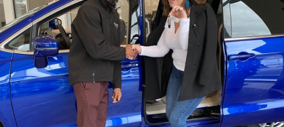 Handshake and keys for the new mini van