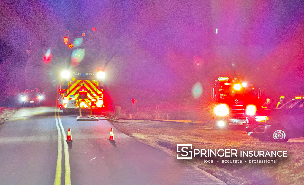 Fire trucks in Powhatan Virginia drafting water from a dry hydrant.