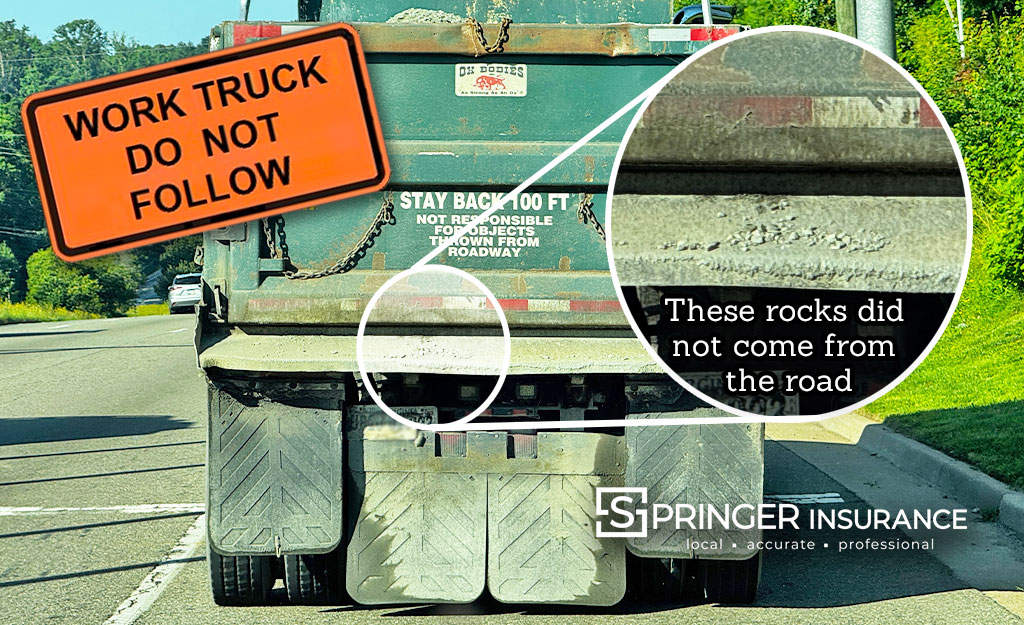 A Gravel Truck that did not brush off it's tailgate.